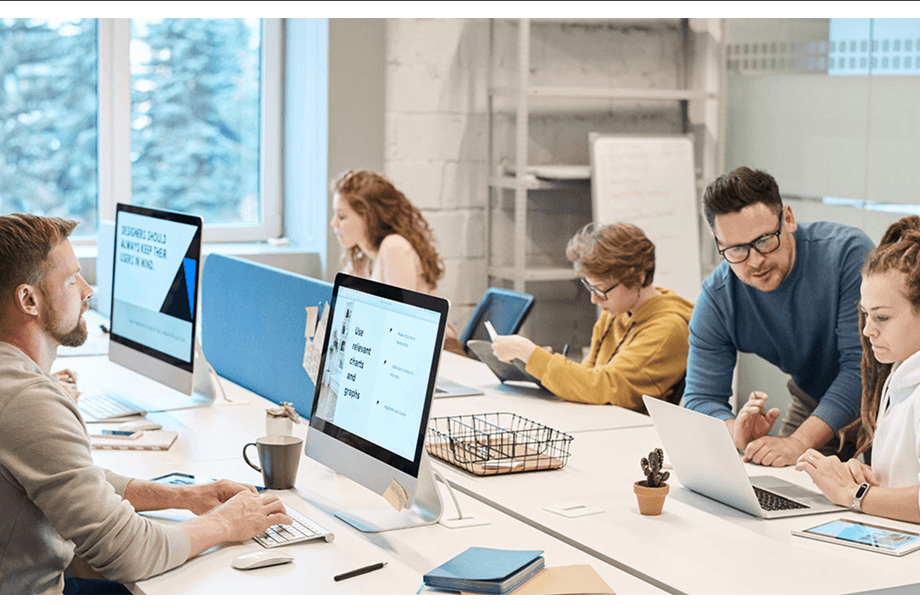 Team of professionals collaborating in a modern office workspace