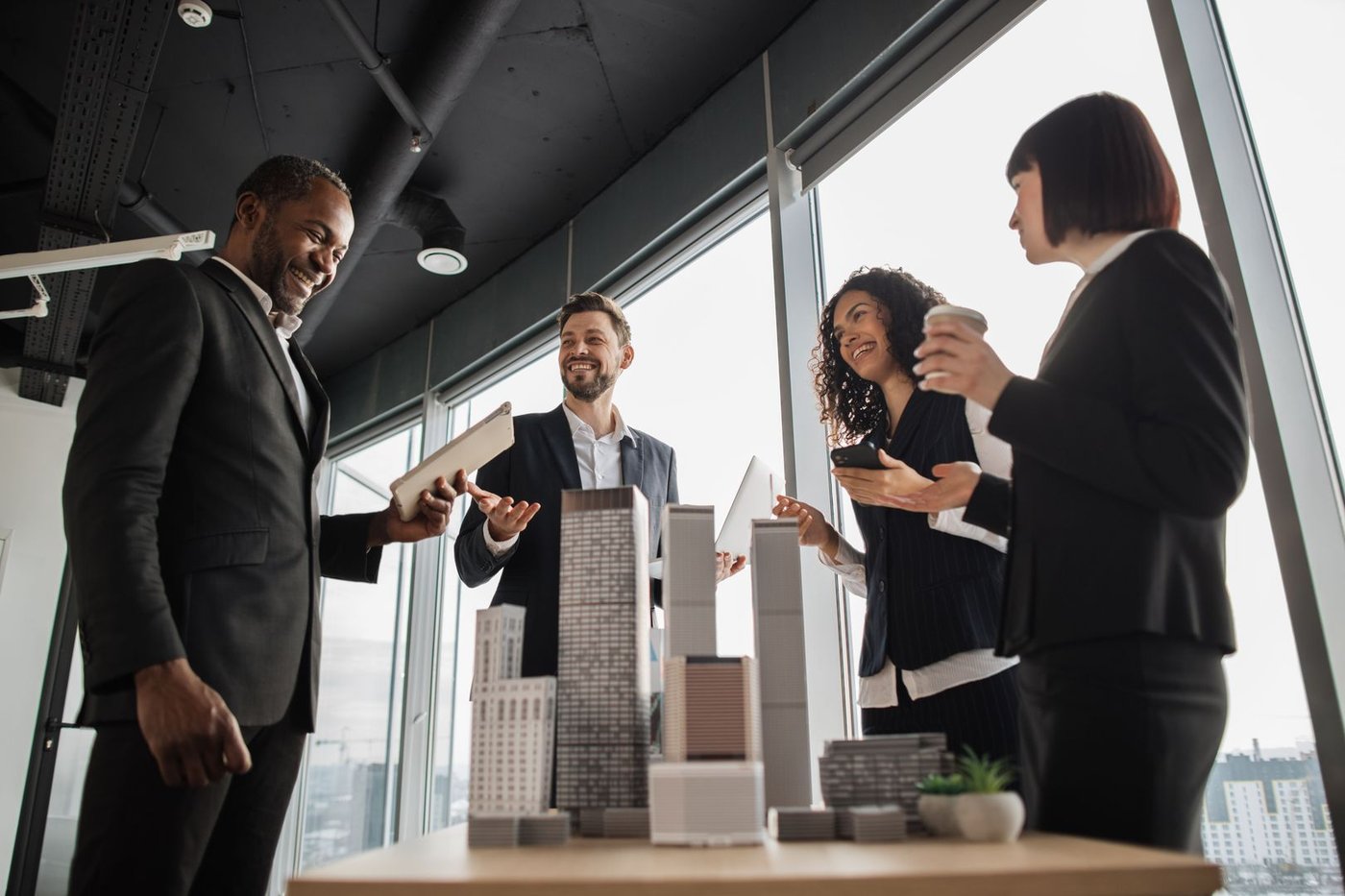 Investment partners meeting and shaking hands